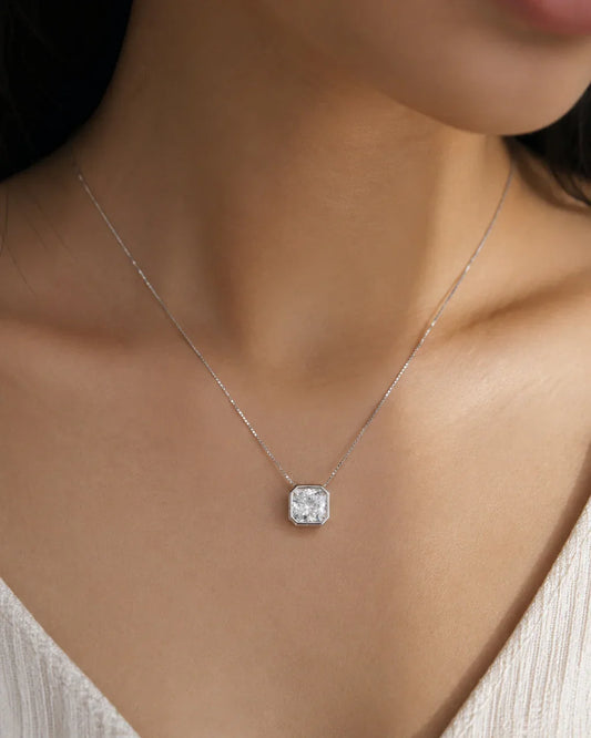 Model Wearing 925 Sterling Silver Princess Solitaire Pendant Necklace with Bezel-Set Square Stone by PEHRO