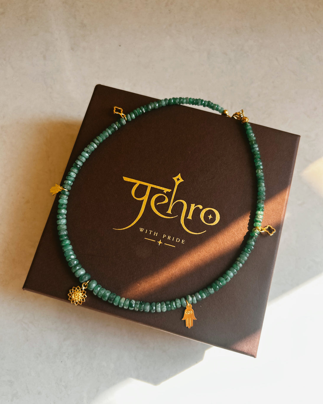 Green faceted Brazilian emerald rondelle bead choker with 18K gold vermeil charms, handcrafted gemstone jewellery by PEHRO