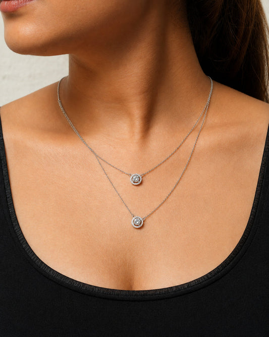 Close-up of the sparkling halo pendant on the PEHRO 925 Sterling Silver Aurora Necklace