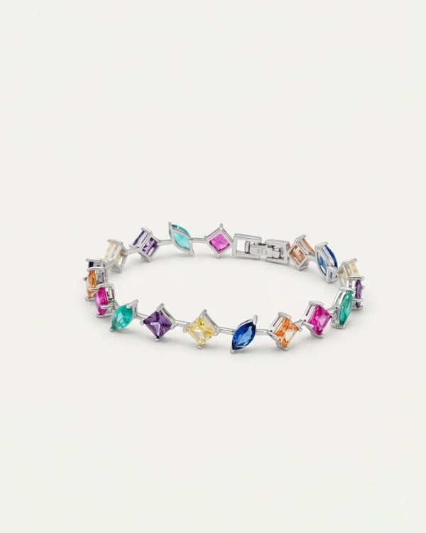 Studio top-down view of the 925 Sterling Silver Multicolor Station Bracelet set with brilliant radiant stones on a pure white background.