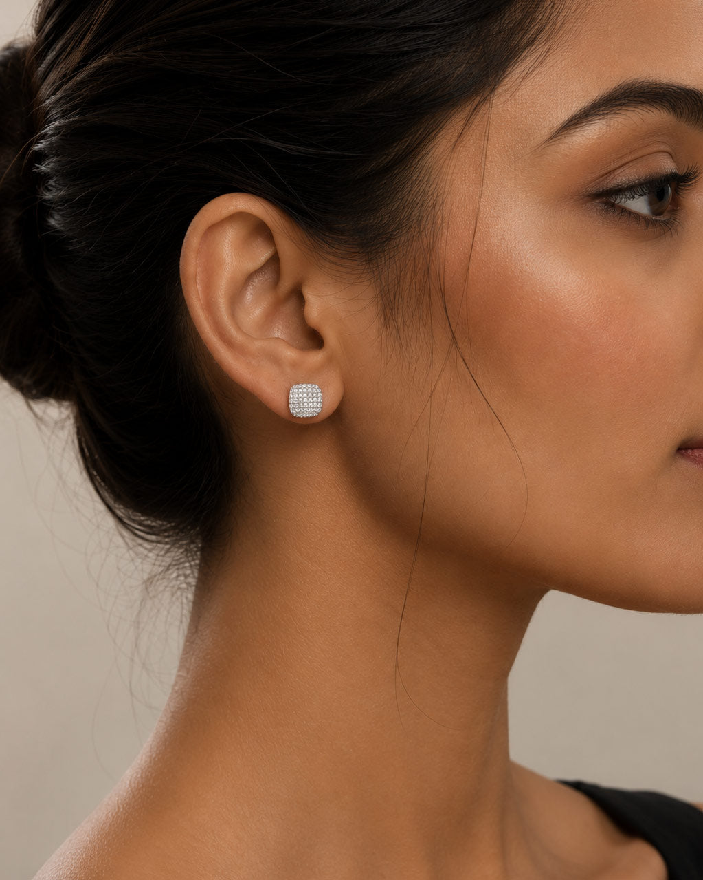 Woman wearing PEHRO 925 Sterling Silver Cushion Pavé Stud Earrings