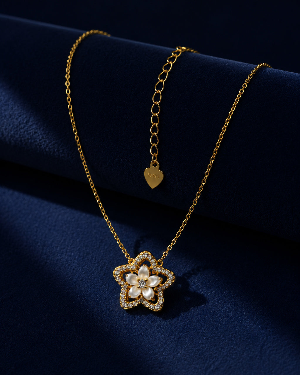 Close-up of the floral pendant on the PEHRO 925 Sterling Silver Blossom Pendant Necklace
