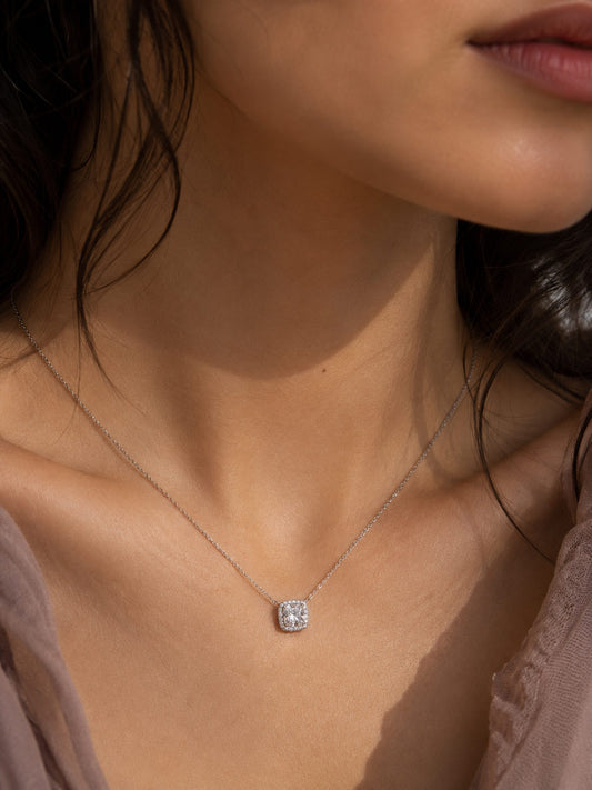 PEHRO Silver Cushion Halo Pendant Necklace worn by a woman