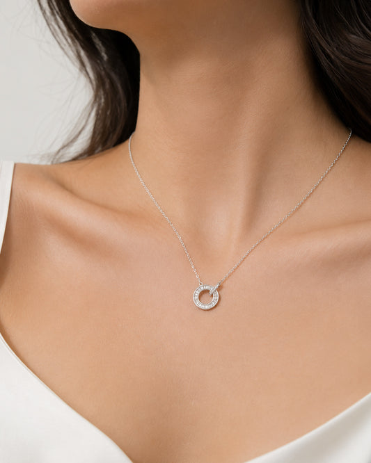 Model wearing PEHRO 925 Sterling Silver Circle Pendant Necklace
