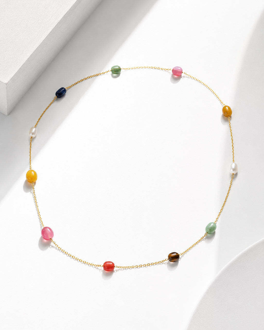 image of the natural Navratna gemstones on the PEHRO signature necklace