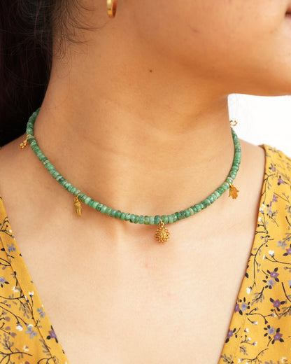 Natural Brazilian emerald beaded choker necklace with Om lotus, hamsa and clover charms in 925 sterling silver with 18K gold vermeil