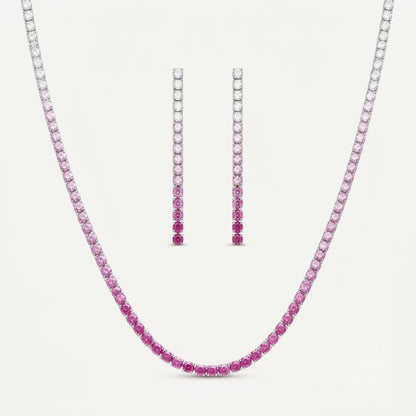 PEHRO pink stone tennis necklace and matching drop earrings set on a white jewelry display