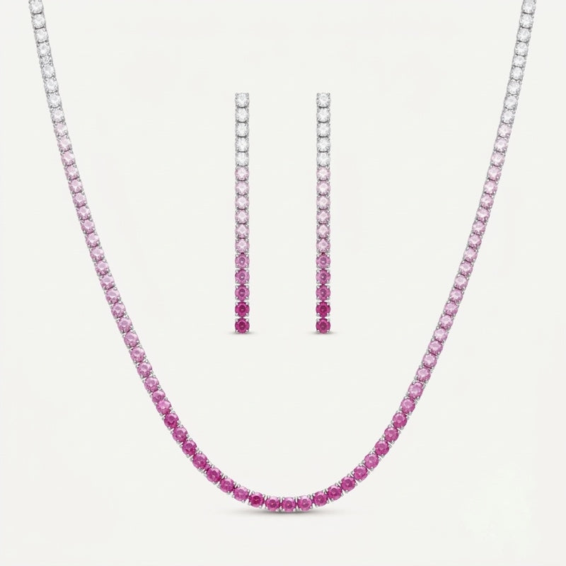 PEHRO pink stone tennis necklace and matching drop earrings set on a white jewelry display