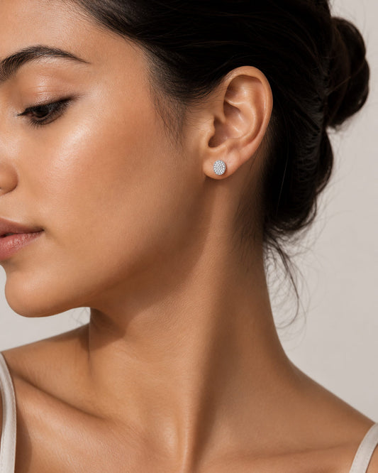 Close-up of the pavé-set oval stud earrings crafted in 925 sterling silver by PEHRO