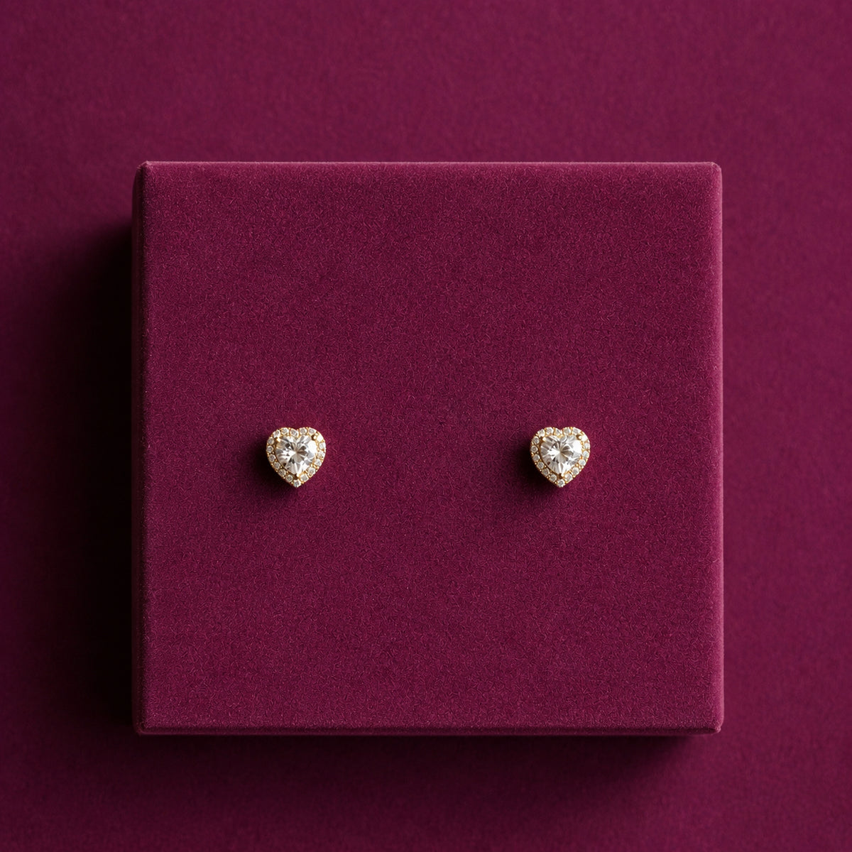 925 sterling silver gold plated heart stud earrings with sparkling centre stone and halo detailing