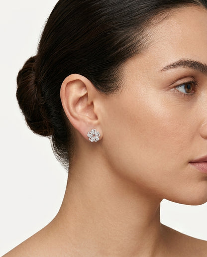 pair of silver flower-shaped stud earrings 