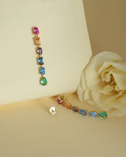 Close-up of the rainbow-coloured stones on the PEHRO Gold Vermeil Drop Earrings