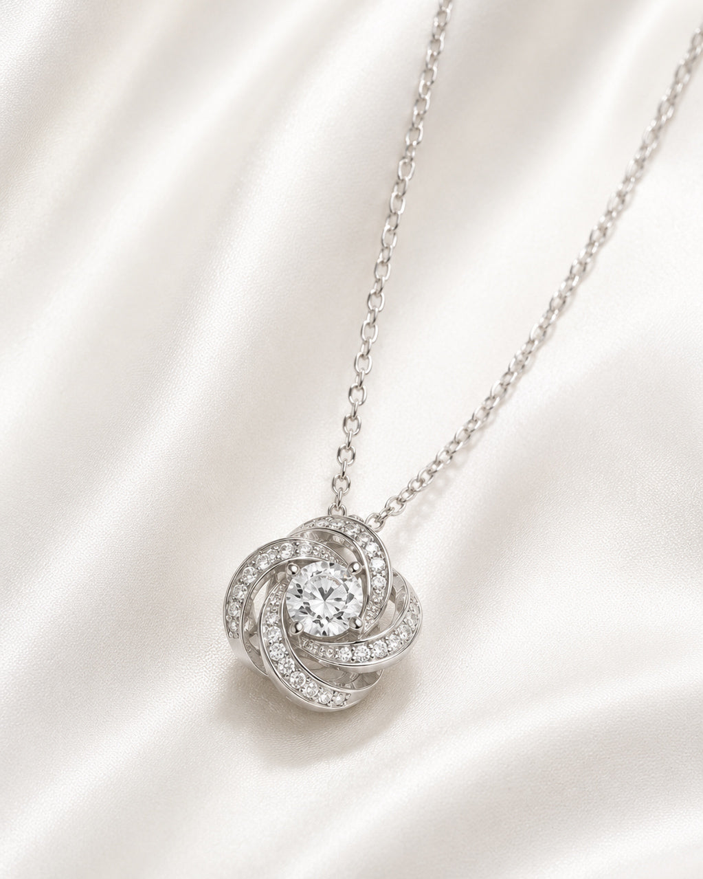 Close-up of 925 Sterling Silver Floral Swirl Pendant Necklace with brilliant stones