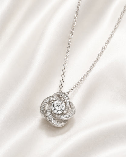 Close-up of 925 Sterling Silver Floral Swirl Pendant Necklace with brilliant stones