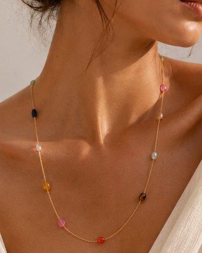 Close-up of the natural Navratna gemstones on the PEHRO signature necklace