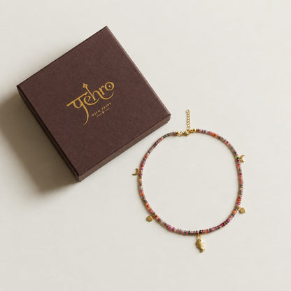 925 sterling silver heart and moon charms in 18K gold vermeil on the Saatrangi tourmaline choker necklace
