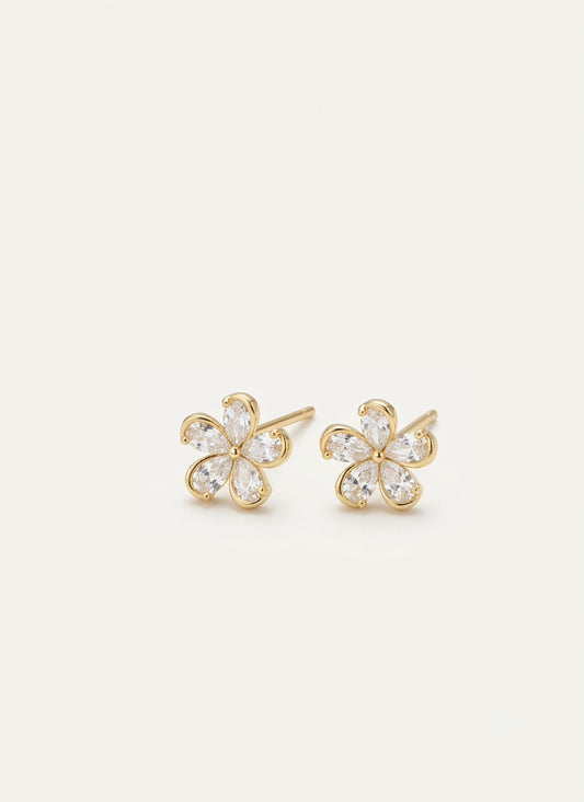 Gold-tone flower-shaped stud earrings with clear stones