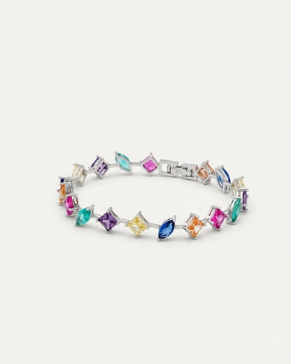 Studio top-down view of the 925 Sterling Silver Multicolor Station Bracelet set with brilliant radiant stones on a pure white background.