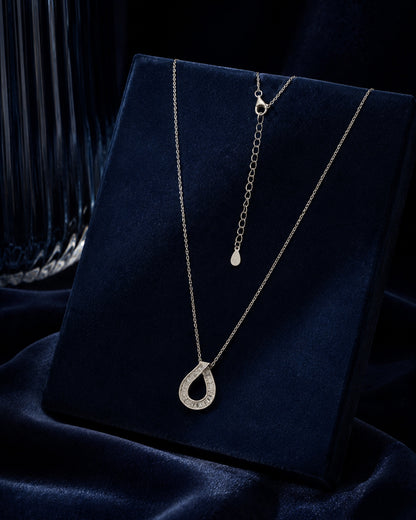 PEHRO 925 Sterling Silver Baguette Teardrop Pendant Necklace displayed on a luxury jewellery background