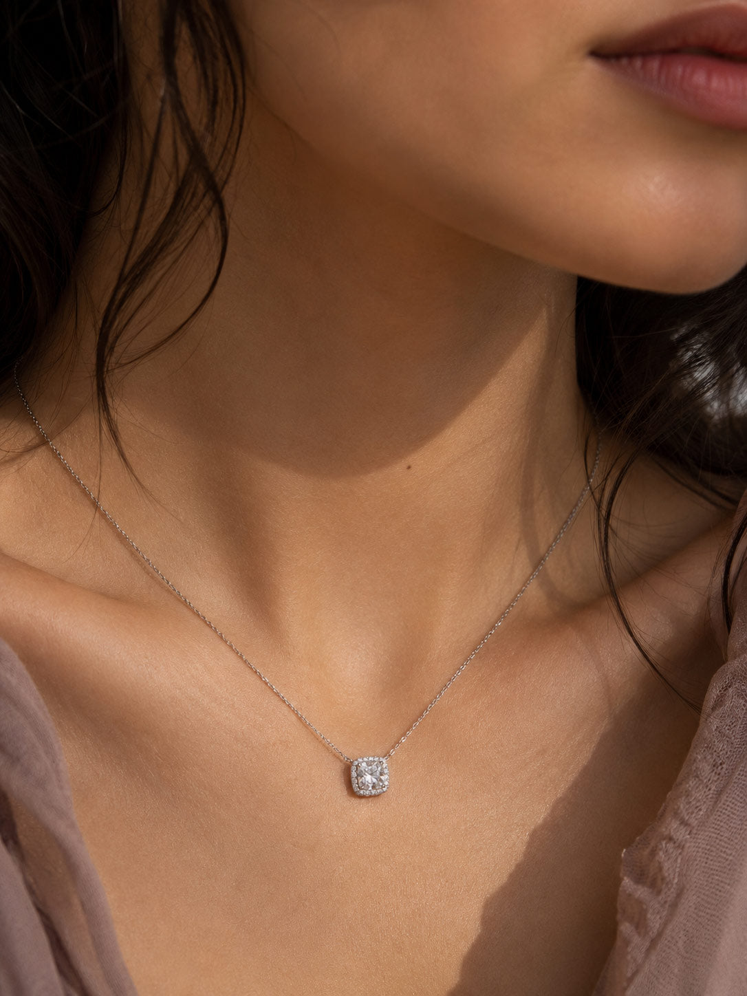PEHRO Silver Cushion Halo Pendant Necklace worn by a woman
