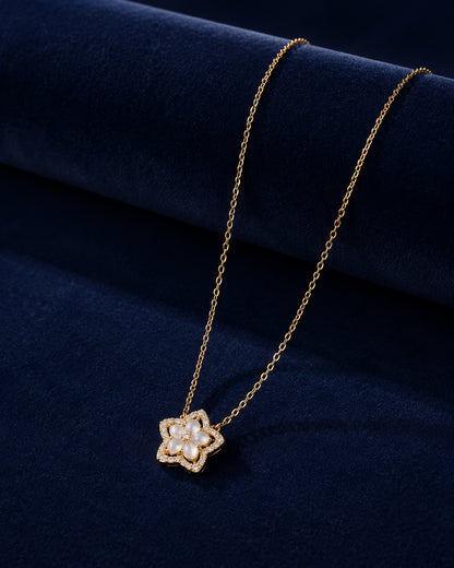 PEHRO 925 Sterling Silver Blossom Pendant Necklace displayed on navy blue velvet