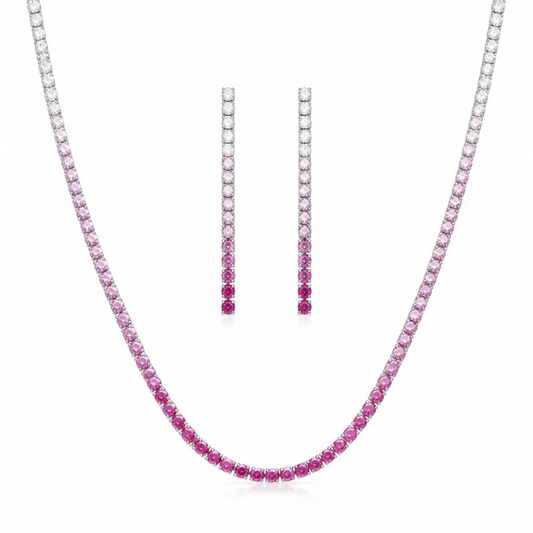 PEHRO pink stone tennis necklace and matching drop earrings set on a white jewelry display