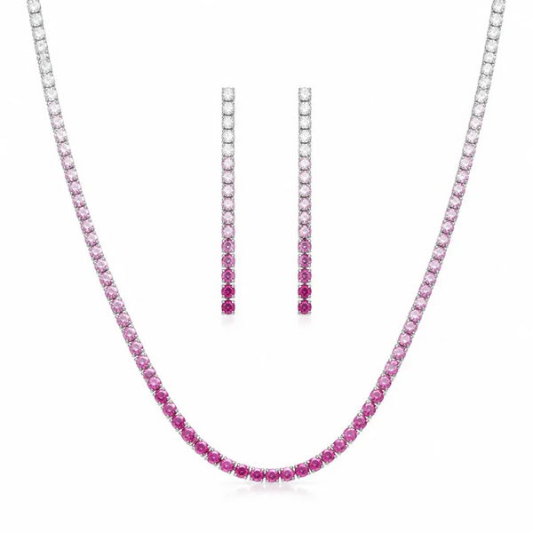 PEHRO pink stone tennis necklace and matching drop earrings set on a white jewelry display